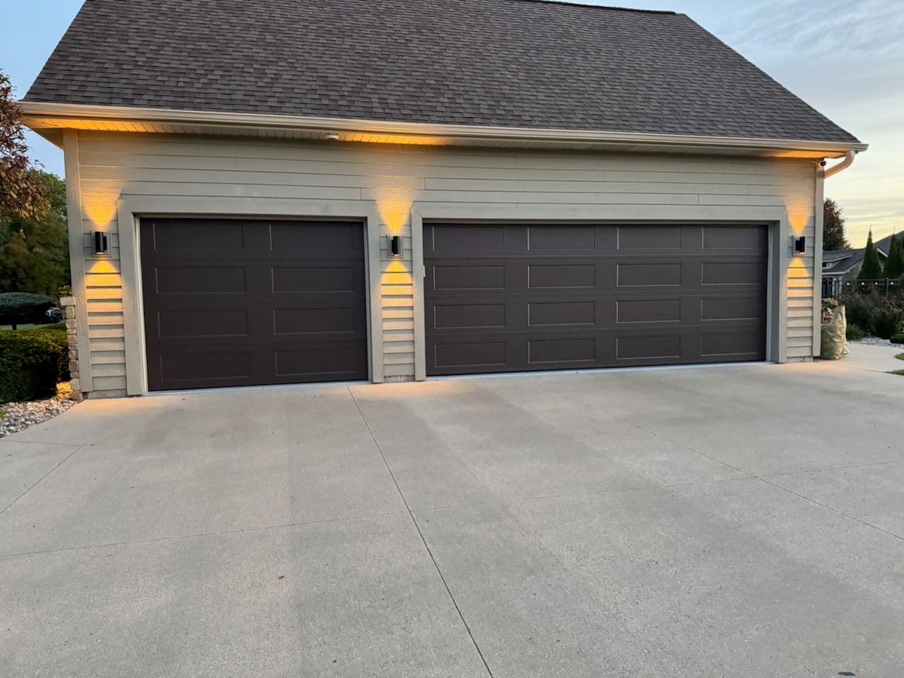 Gallery photos for Sleek Brown Paneled Garage Door Installation: Image #1