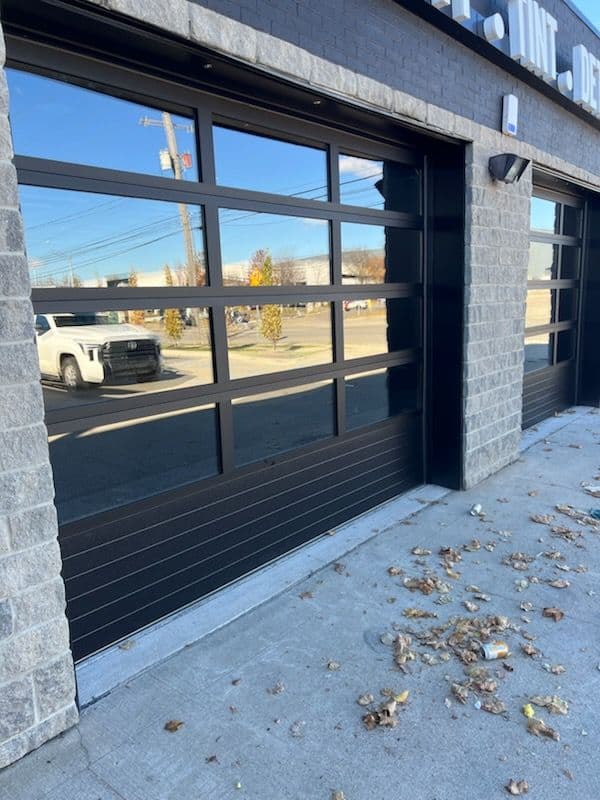 Sleek Glass Garage Doors Elevate Local Business