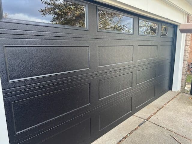 Gallery photos for Stylish Black Garage Door Installation: Image #1